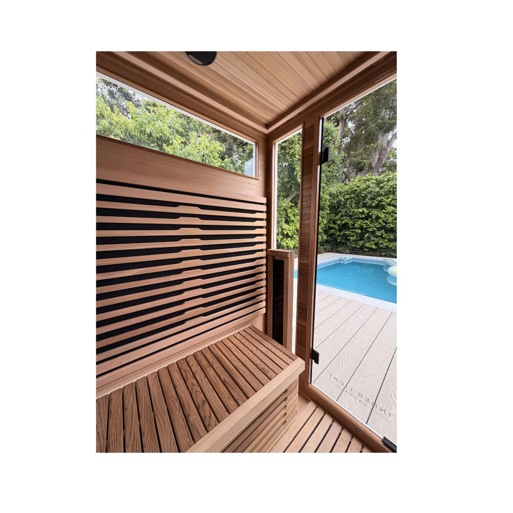 Inside the Bella Deluxe looking out through the cedar-lined interior to the pool